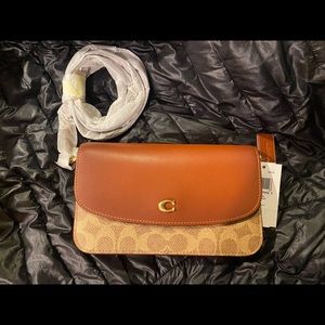 Tan/rust Coach cross body wallet